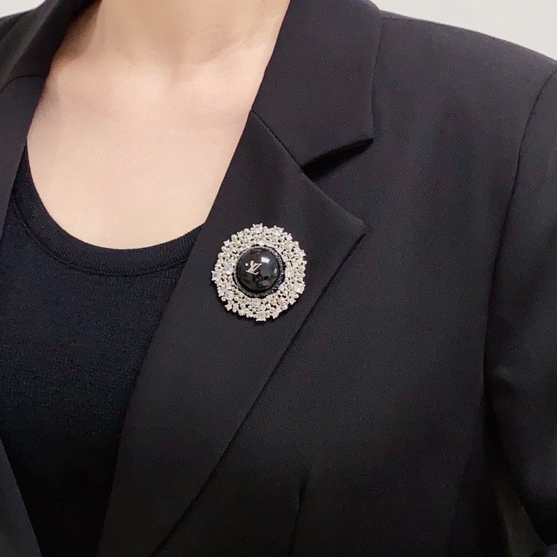Louis Vuitton Black Ball 18K Gold Brooch
