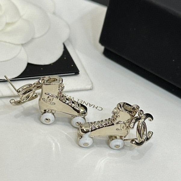 Chanel Skate Shoe Pendant 18K Gold Earrings